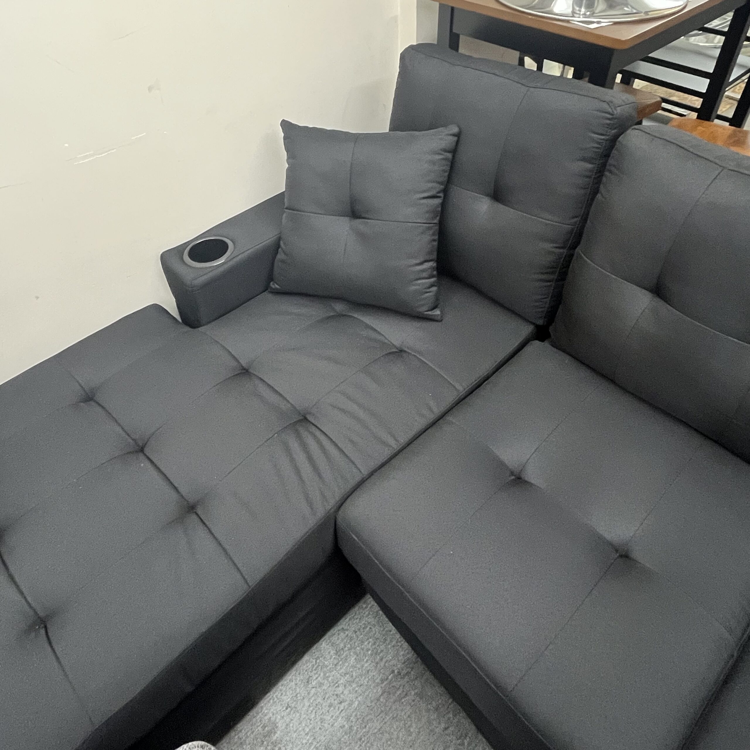 Black Fabric Sectional Sofa with Chaise Storage & Cup Holders - Image 6