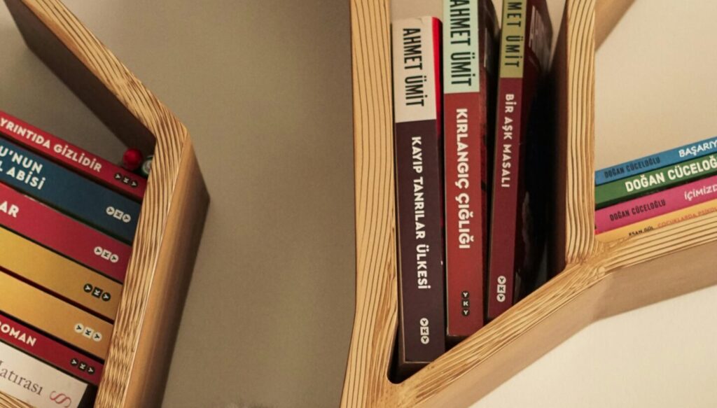 Best bookshelf for small home office Canada showing a tall narrow bookshelf in a compact modern workspace
