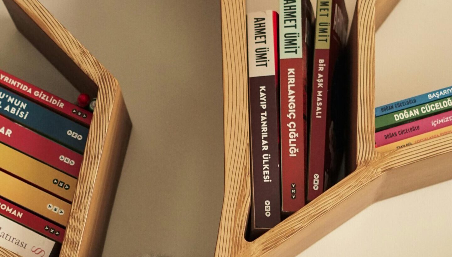 Best bookshelf for small home office Canada showing a tall narrow bookshelf in a compact modern workspace