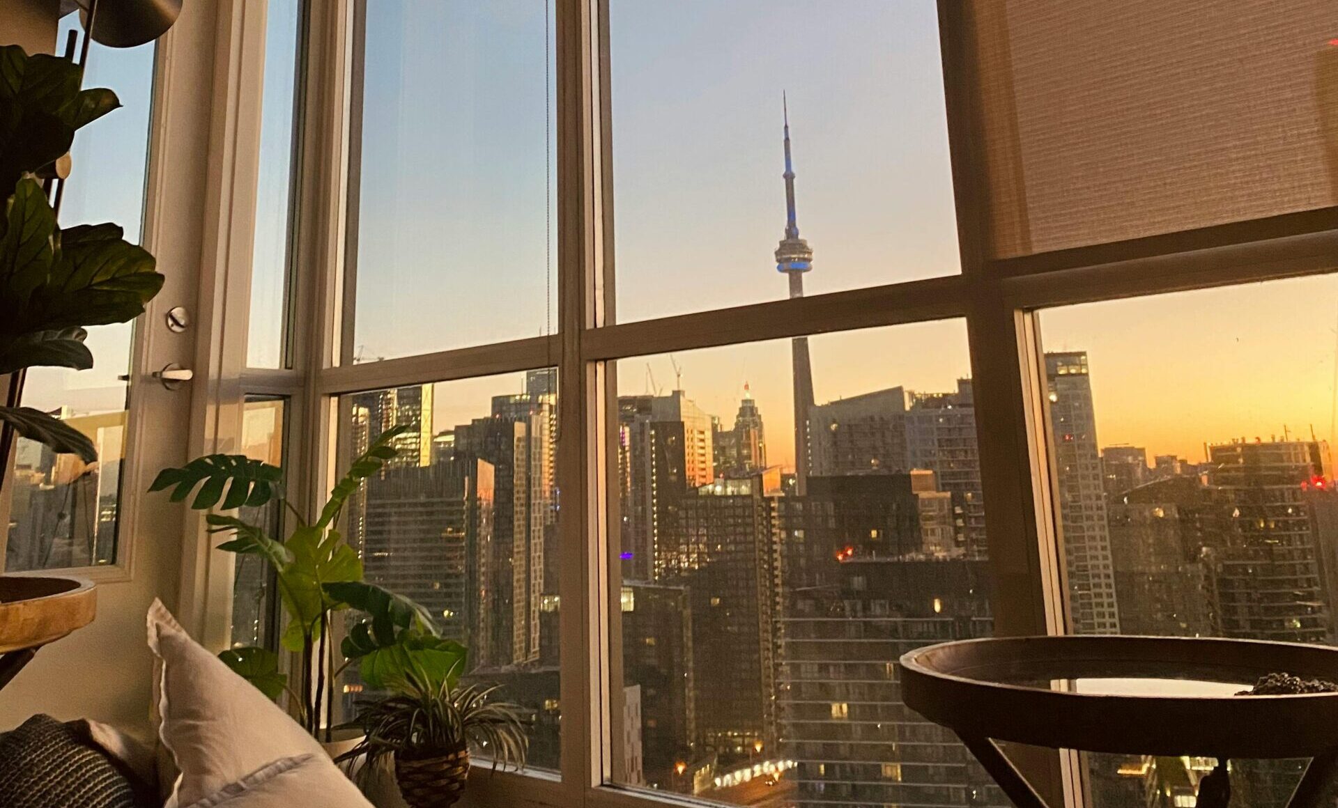 How to furnish a condo living room in Toronto with a compact sofa coffee table and open layout without feeling crowded