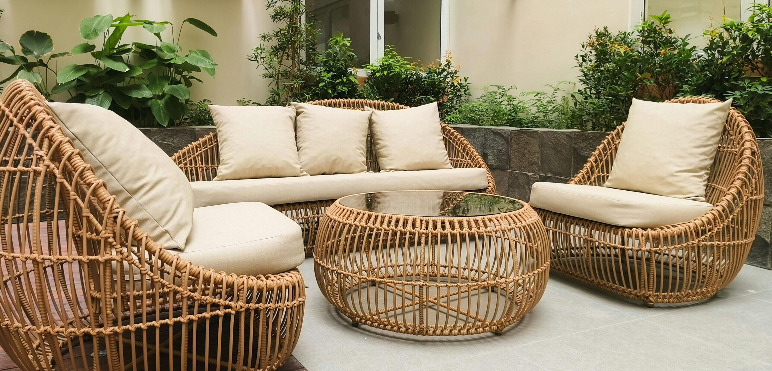 How to choose outdoor patio furniture for Canadian climate showing a powder coated aluminum conversation set on a wooden deck in a Canadian backyard