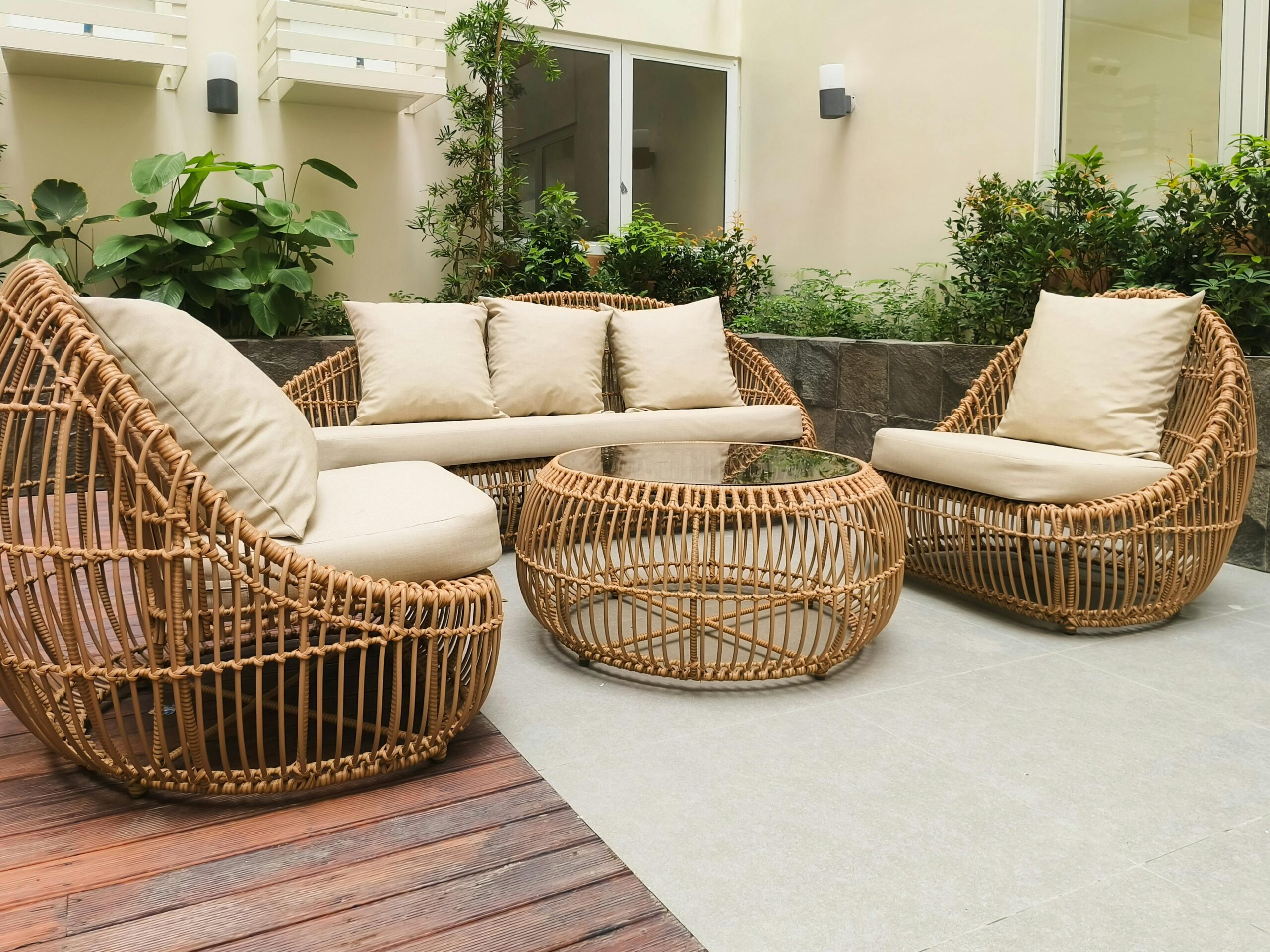 How to choose outdoor patio furniture for Canadian climate showing a powder coated aluminum conversation set on a wooden deck in a Canadian backyard